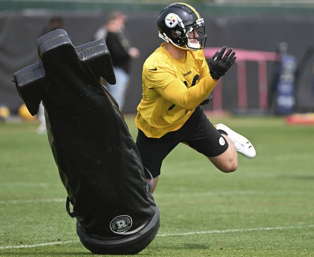 Steelers linebacker TJ Watt goes through drills during OTAs in May at UPMC Rooney Sports Performance Complex.