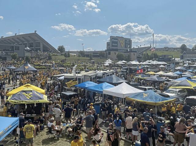 Tailgaters at the West Virginia University Mountaineers vs. the University of Pittsburgh Panthers football game on Saturday.