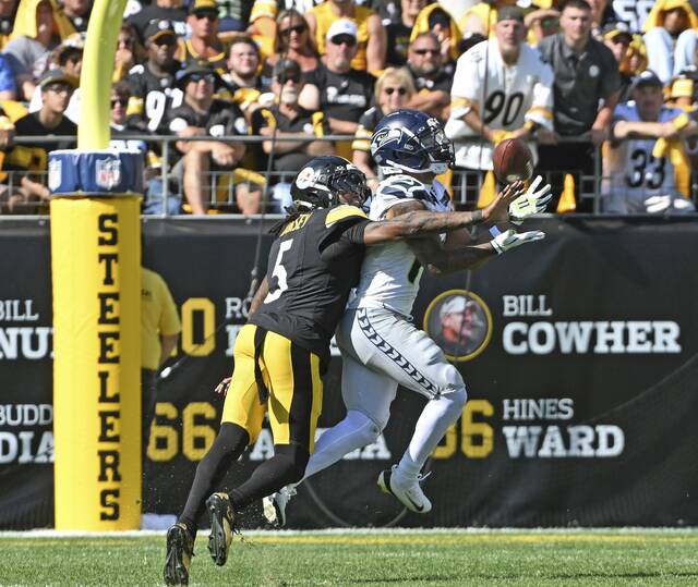 Seahawks receiver Jaxon Smith-Njigba beats the Steelers’ Jalen Ramsey in the fourth quarter Sunday