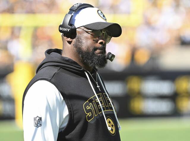Pittsburgh Steelers coach Mike Tomlin stands on the sidelines during the fourth quarter of Sunday’s home-opener loss against the Seattle Seahawks at Acrisure Stadium.