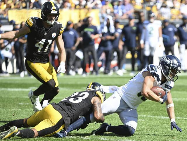 Seahawks receiver Cooper Kupp with a first-down catch past the Steelers’ Darius Slay in the third quarter Sunday Sept. 14, 2025 at Acrisure Stadium.