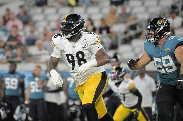 Shown while playing during a preseason game his rookie season in 2022, DeMarvin Leal was re-signed to the active roster of the Pittsburgh Steelers on Wednesday after opening the season on their practice squad. Leal has transitioned from defensive lineman to outside linebacker over his four seasons with the Steelers.