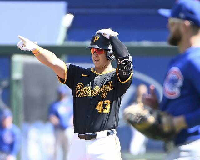 Pirates first baseman Rafael Flores celebrates his double, his first major league hit, against the Cubs on Wednesday at PNC Park.