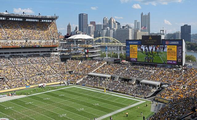 Fans at Acrisure Stadium watch the second half of an NFL football game between the Pittsburgh Steelers and the New England Patriots in Pittsburgh, Sunday, Sept. 18, 2022.
