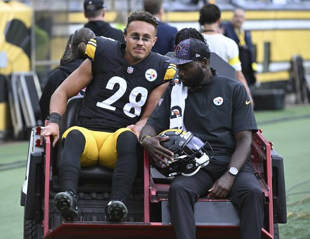 Pittsburgh Steelers special-teams captain Miles Killebrew is carted off the field after suffering a knee injury during Sunday’s game against the Cleveland Browns at Acrisure Stadium.