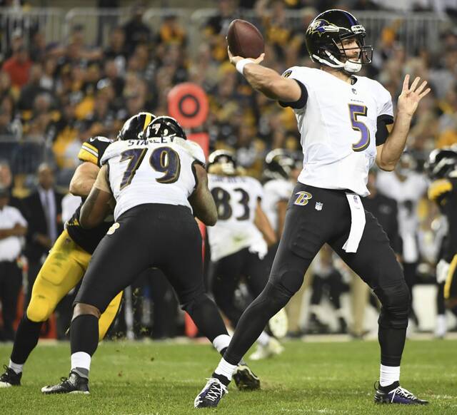 Ravens quarterback Joe Flacco throws against the Steelers in the third quarter Sunday, Sept. 30, 2018 at Heinz Field.