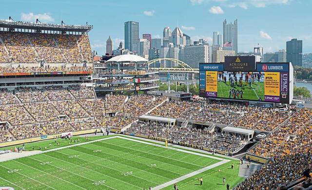 Fans at Acrisure Stadium watch the second half of an NFL football game between the Pittsburgh Steelers and the New England Patriots in Pittsburgh, Sunday, Sept. 18, 2022. (AP Photo/Don Wright)