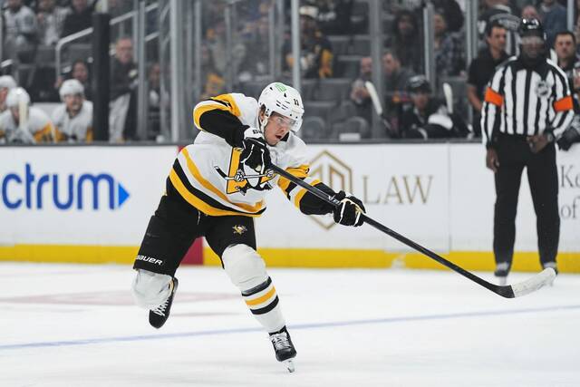 Penguins forward Filip Hallander attempts a shot during the first period against the Los Angeles Kings on Thursday.