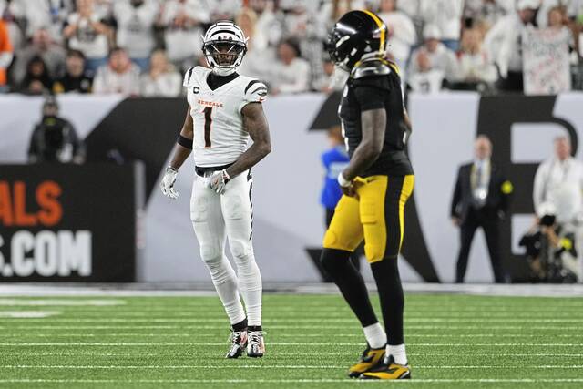 Cincinnati Bengals wide receiver Ja’Marr Chase (1) looks toward Pittsburgh Steelers cornerback Jalen Ramsey (5) during the second half Thursday, Oct. 16, 2025, in Cincinnati.