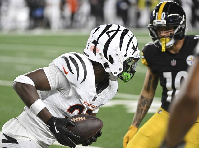 The Bengals’ Jordan Battle picks off an Aaron Rodgers pass in the second quarter Oct. 16, 2025, at Paycor Stadium in Cincinnati.