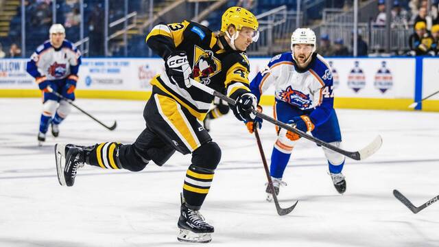 Wilkes-Barre/Scranton Penguins forward Danton Heinen shoots the puck during a game against the Bridgeport Islanders at the Total Mortgage Arena in Bridgeport, Conn. on Saturday. The Penguins won, 6-3.