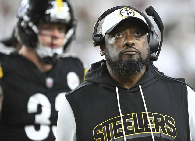 Steelers head coach Mike Tomlin walks the sideline against the Bengals on Thursday at Paycor Stadium in Cincinnati.