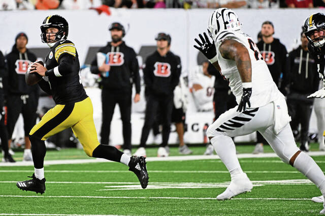 Pittsburgh Steelers quarterback Aaron Rodgers rolls out during the second quarter of this past Thursday’s game against the Cincinnati Bengals at Paycor Stadium. Rodgers has more passing touchdowns than any quarterback whose team has played only six games this season.