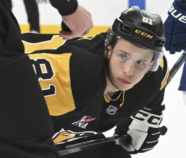 The Penguins’ Ben Kindel waits for a faceoff against the Canucks on Tuesday at PPG Paints Arena.