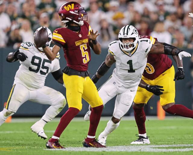 Packers defensive end Micah Parsons rushes Washington quarterback Jayden Daniels during their Sept. 11 game.
