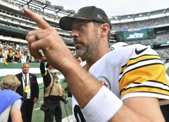 Steelers quarterback Aaron Rodgers celebrates as he leave the field after beating the New York Jets on Sept. 7, 2025, at MetLife Stadium.