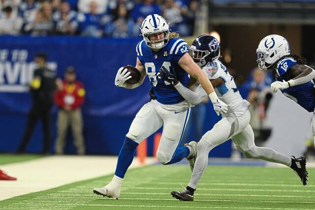 Indianapolis Colts tight end Tyler Warren runs after a catch against the Tennessee Titans on Oct. 26 in Indianapolis.