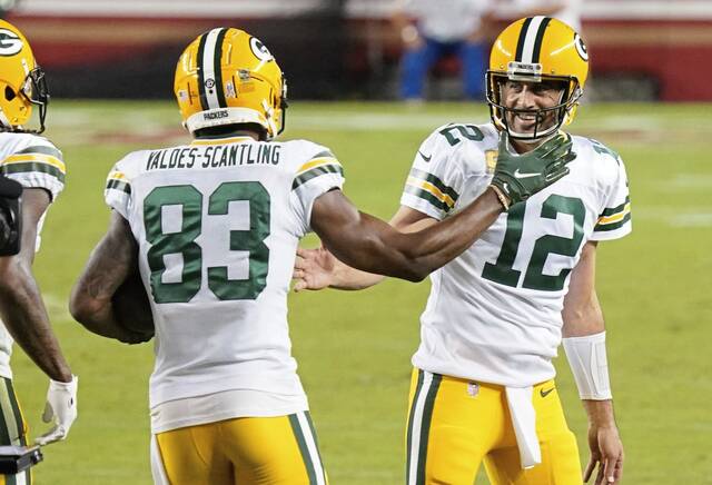 From Nov 5, 2020: Green Bay Packers wide receiver Marquez Valdes-Scantling celebrates a touchdown pass with quarterback Aaron Rodgers at Levi’s Stadium in Santa Clara, Calif.