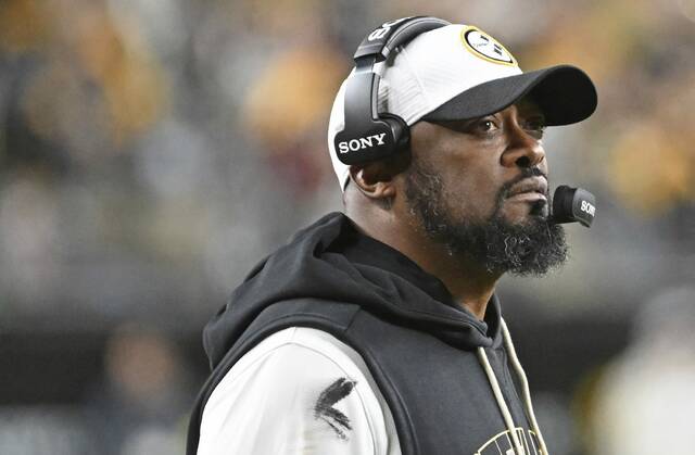 Steelers head coach Mike Tomlin on the sideline against the Packers on Sunday at Acrisure Stadium.