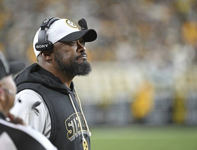 Steelers head coach Mike Tomlin on the sideline against the Packers on Sunday at Acrisure Stadium.
