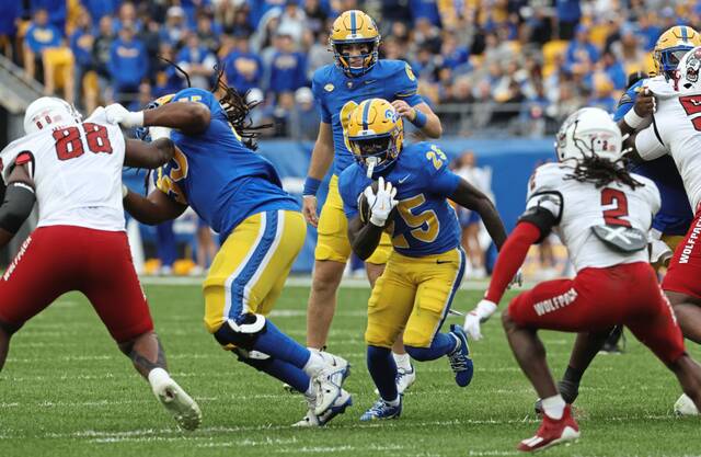Pitt running back Ja’Kyrian Turner (25) runs the ball against N.C. State during the first quarter Oct. 25, 2025, at Acrisure Stadium.