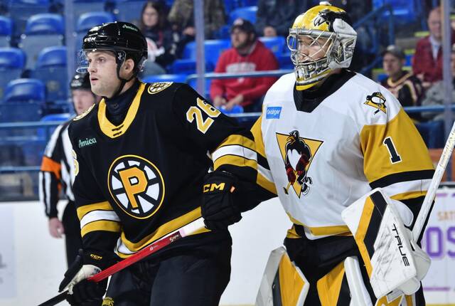 Providence Bruins forward John Farinacci establishes position in front of Wilkes-Barre/Scranton Penguins goaltender Sergei Murashov during a game at the Mohegan Sun Arena in Wilkes-Barre on Wednesday. The Bruins won, 3-1.