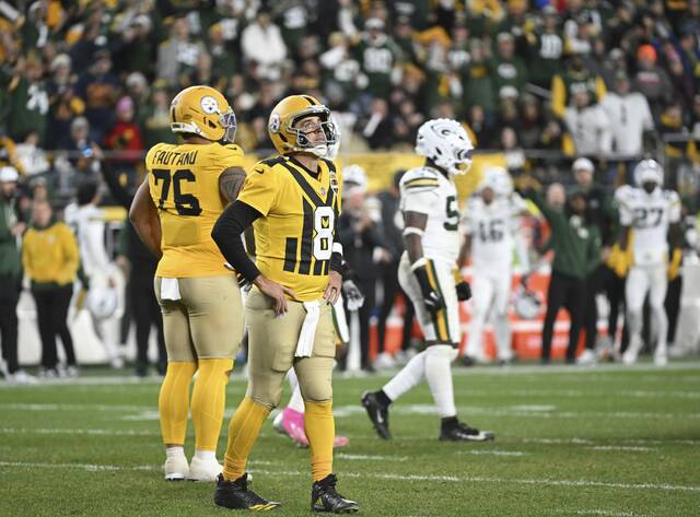 Steelers quarterback Aaron Rodgers reacts to a Kenneth Gainwell fumble against the Packers in the fourth quarter Oct. 26, 2025, at Acrisure Stadium.