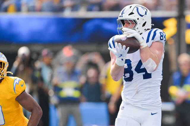 Indianapolis Colts tight end Tyler Warren makes a catch for a touchdown during a game against the Los Angeles Chargers at SoFi Stadium earlier this season. A rookie from Penn State, Warren leads all NFL tight ends in receptions.