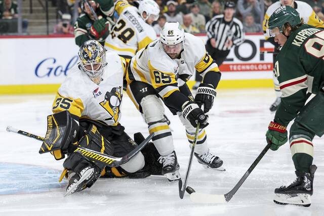 Pittsburgh Penguins goaltender Tristan Jarry (35) makes a save against Minnesota Wild left wing Kirill Kaprizov (97) during the second period Oct. 30, 2025, at Grand Casino Arena.