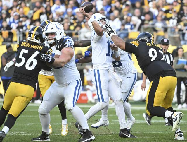 The Steelers’ Cam Heyward pressures Colts quarterback Daniel Jones in the fourth quarter Sunday at Acrisure Stadium.