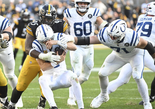 The Steelers’ Keeanu Benton sacks Colts quarterback Daniel Jones in the fourth quarter Sunday at Acrisure Stadium.