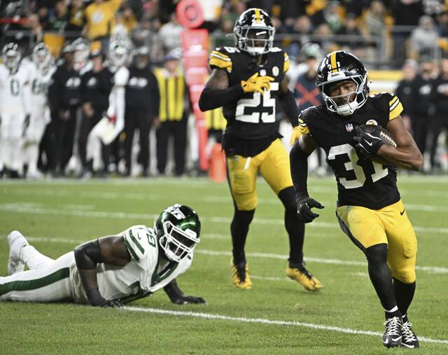The Steelers’ Beanie Bishop returns an interception against the Jets on Oct. 20, 2024, at Acrisure Stadium.
