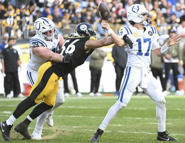 Pittsburgh Steelers outside linebacker Alex Highsmith strip-sacks Indianapolis Colts quarterback Daniel Jones during the fourth quarter of Sunday’s game at Acrisure Stadium. Highsmith was named the AFC defensive player of the week for his efforts in that game.