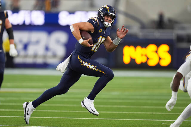 Los Angeles Chargers quarterback Justin Herbert runs with the football during a game last month. The Chargers host the Steelers on Sunday night.