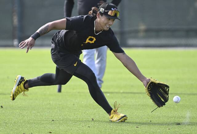 Pirates outfielder Ji Hwan Bae fields a ball during spring training last February in Bradenton, Fla.