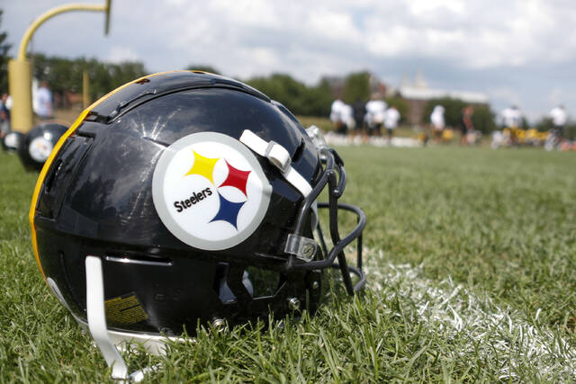A Pittsburgh Steelers helmet is seen on the practice fields during training camp at Saint Vincent College.