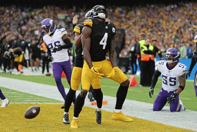 Steelers wide receiver DK Metcalf celebrates his touchdown against the Minnesota Vikings at Croke Park in Dublin on Sept. 28.