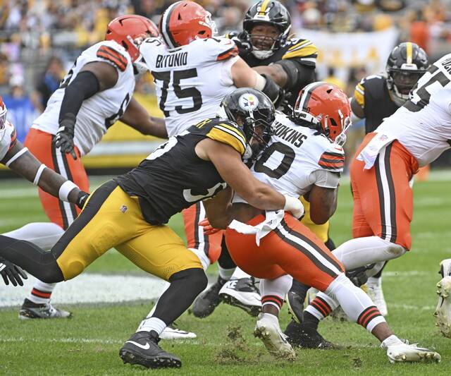 Shown while making a tackle of the Cleveland Browns’ Quinshon Judkins during a game last month at Acrisure Stadium, Pittsburgh Steelers outside linebacker Alex Highsmith has a pectoral injury that caused him to miss last week’s win against the Cincinnati Bengals.