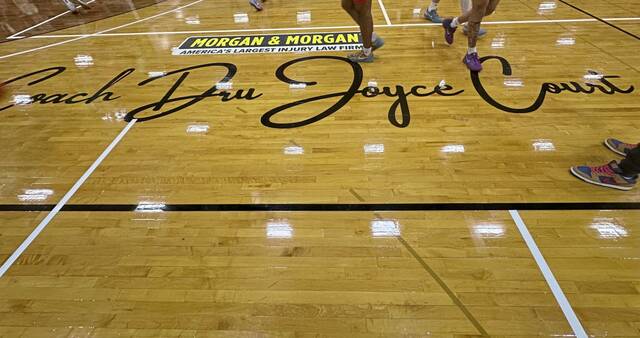 The court at LeBron James Arena, named for St. Vincent-St. Mary High School coach Dru Joyce II, shown before the start of Duquesne’s game against Towson on Dec. 14, 2024, in Akron, Ohio.