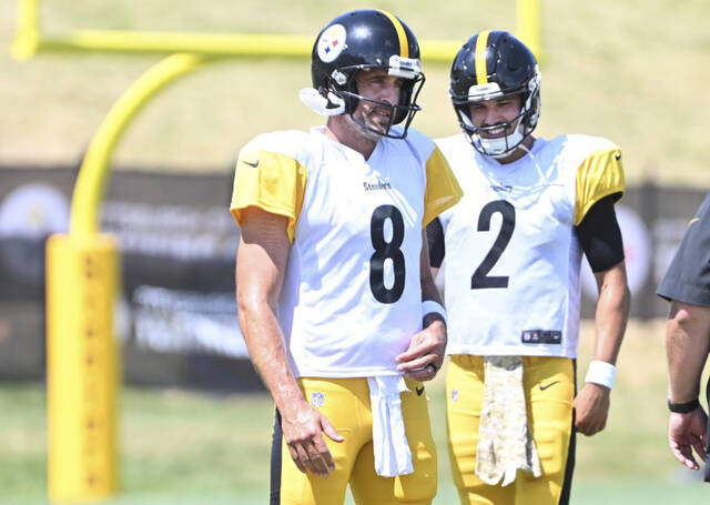 Steelers quarterbacks Aaron Rodgers and Mason Rudolph work during an Aug. 12 practice at Saint Vincent College.