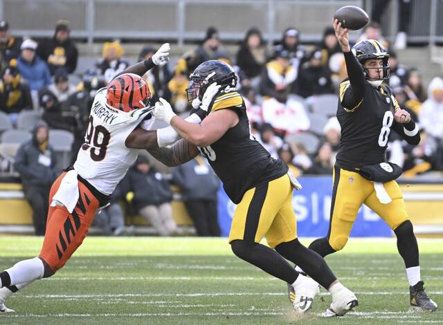 The official designation on the league-mandated status report for Pittsburgh Steelers quarterback Aaron Rodgers for Sunday’s game at the Chicago Bears remains questionable.