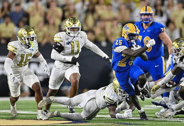 Pitt’s Ja’Kyrian Turner breaks the tackle from Georgia Tech’s E.J. Lightsey during the fourth quarter of their game Nov. 22, 2025, at Bobby Dodd Stadium in Atlanta, Ga.