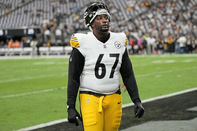 Shown here while warming up before a game last season, Pittsburgh Steelers veteran offensive tackle Calvin Anderson is prepared to step in and start at left tackle if Broderick Jones (neck) cannot play Sunday.