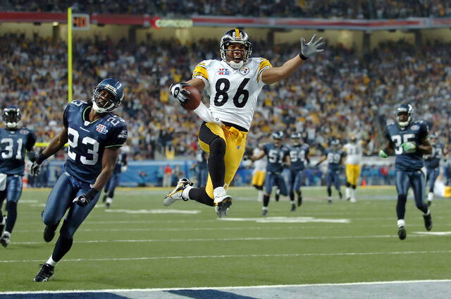 Hines Ward sails into the end zone in Super Bowl XL on Feb. 5, 2006.