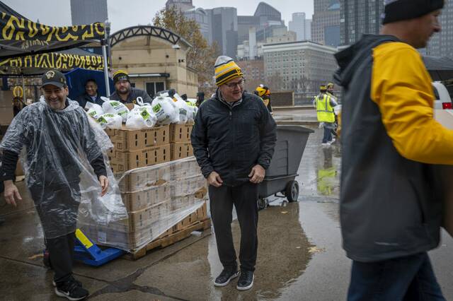 Travis Williams, president of the Pittsburgh Pirates, looks on during an event where players and staff from the Pirates, Steelers and Penguins participated in the fifth annual #BurghProud Thanksgiving meal distribution next to Bill Mazeroski statue Tuesday, Nov. 25, 2025 on the North Shore. The three teams joined forces once again to support local families ahead of the holiday.