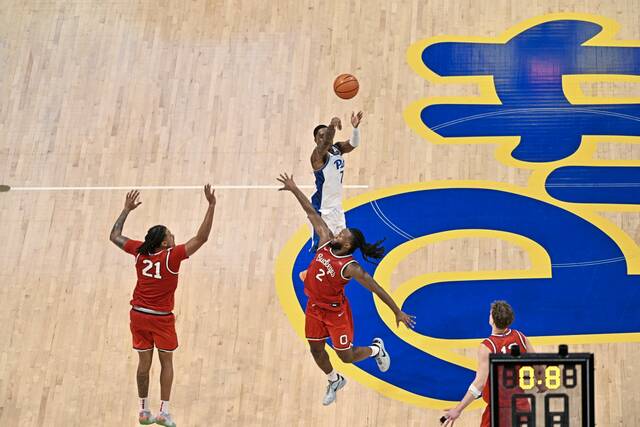 Pitt's Damarco Minor launches the winning shot against Ohio State on Friday, Nov. 28, 2025, at Petersen Events Center.
