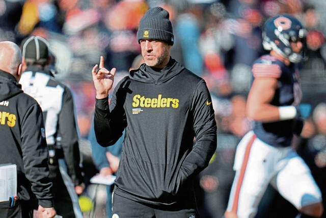 Shown here while watching from the sidelines during last week’s game, Pittsburgh Steelers quarterback Aaron Rodgers has been cleared to play in Sunday’s game against the Buffalo Bills.