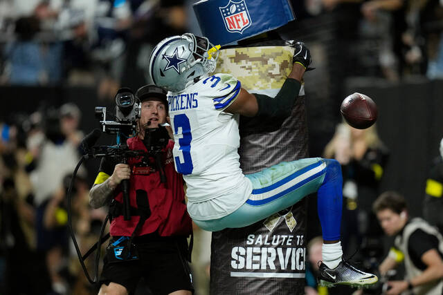 Dallas Cowboys wide receiver George Pickens celebrates his touchdown against the Las Vegas Raiders during the first half of an NFL football game Monday, Nov. 17, 2025, in Las Vegas.