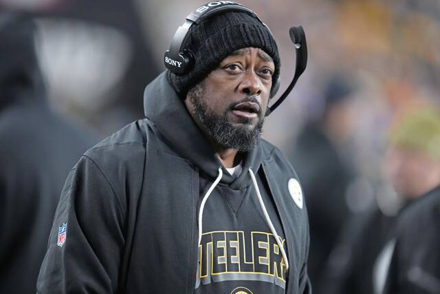 Pittsburgh Steelers head coach Mike Tomlin stands on the sideline during the first half of an NFL football game against the Buffalo Bills Sunday, Nov. 30, 2025, in Pittsburgh.