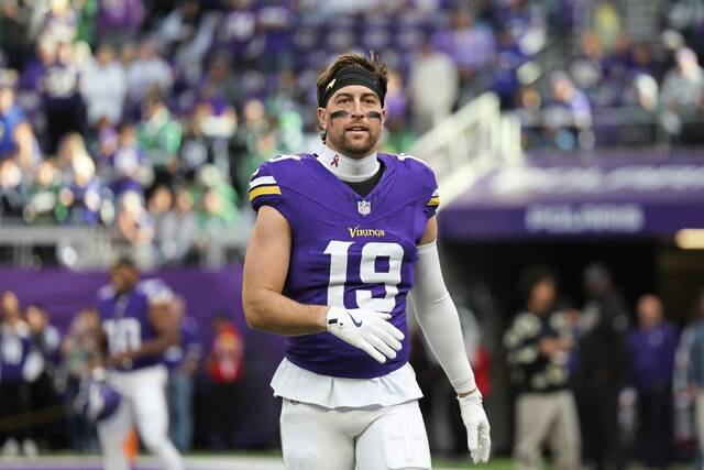 Minnesota Vikings wide receiver Adam Thielen warms up before an NFL football game against the Philadelphia Eagles, Oct. 19, 2025, in Minneapolis.